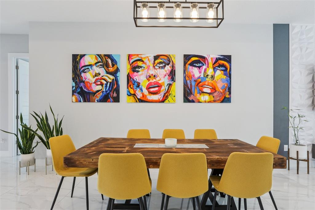 352 Mehlenbacher Road Belleair, FL 33756 - Photo 16 of 88 a dining room with furniture and wooden floor