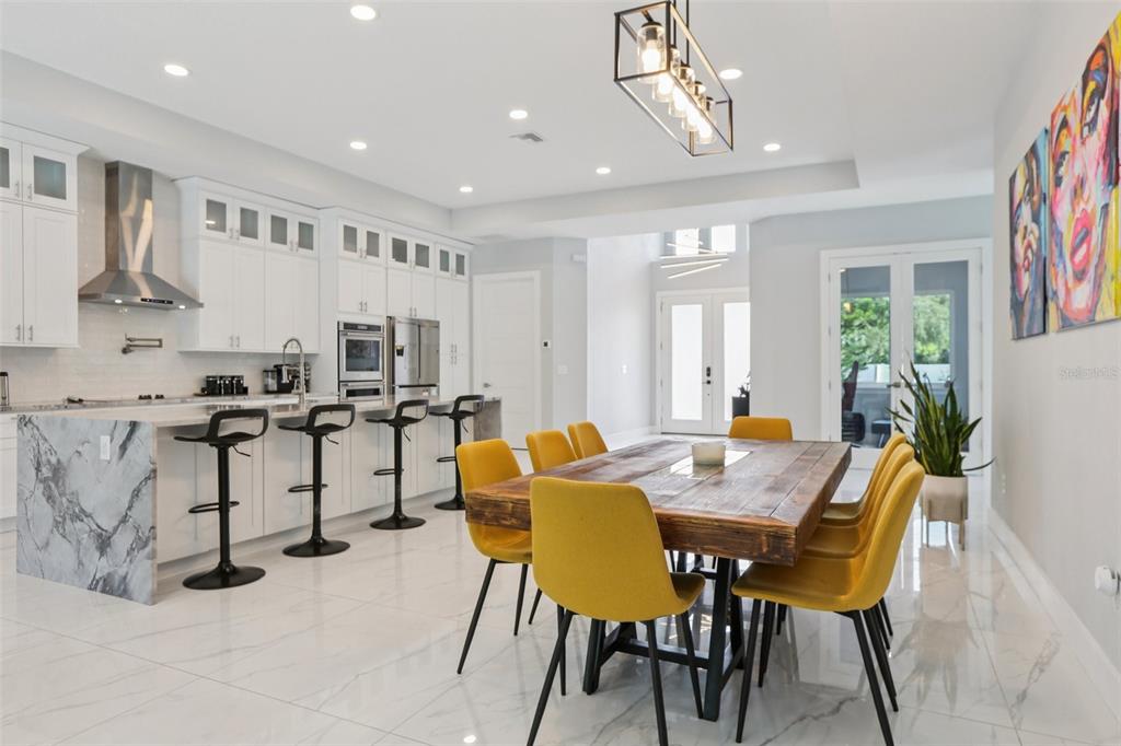 352 Mehlenbacher Road Belleair, FL 33756 - Photo 20 of 88 a view of a dining room with furniture