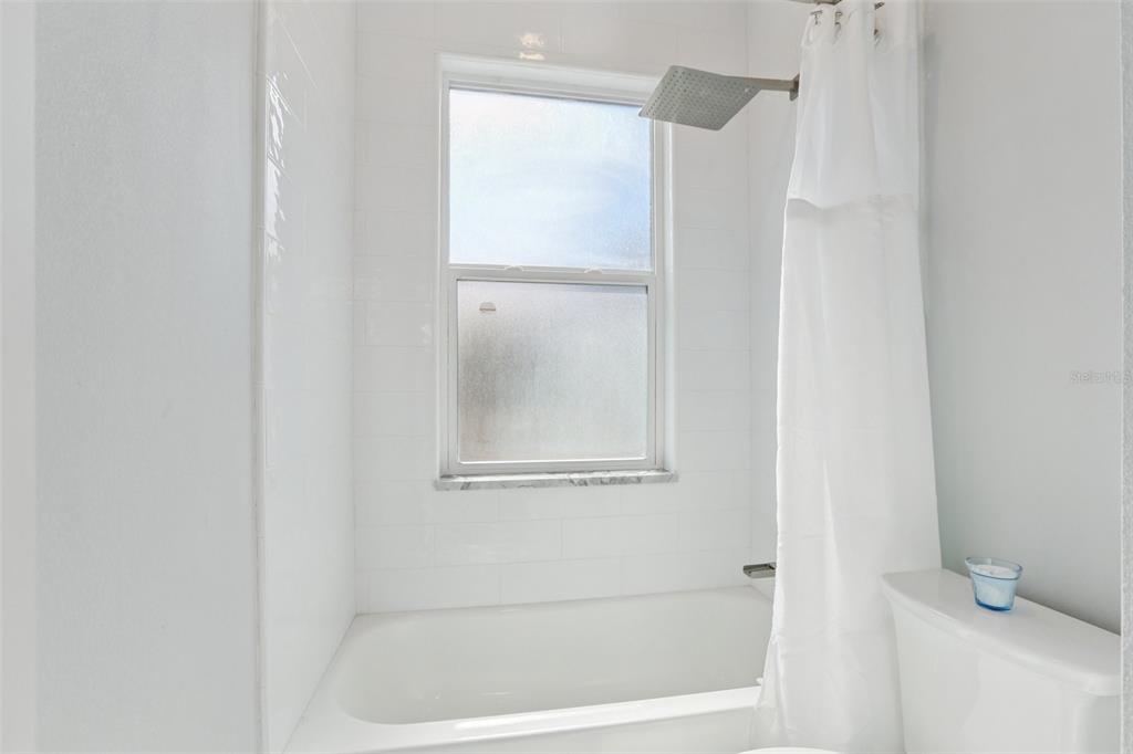 352 Mehlenbacher Road Belleair, FL 33756 - Photo 41 of 88 a bathroom with a bath tub