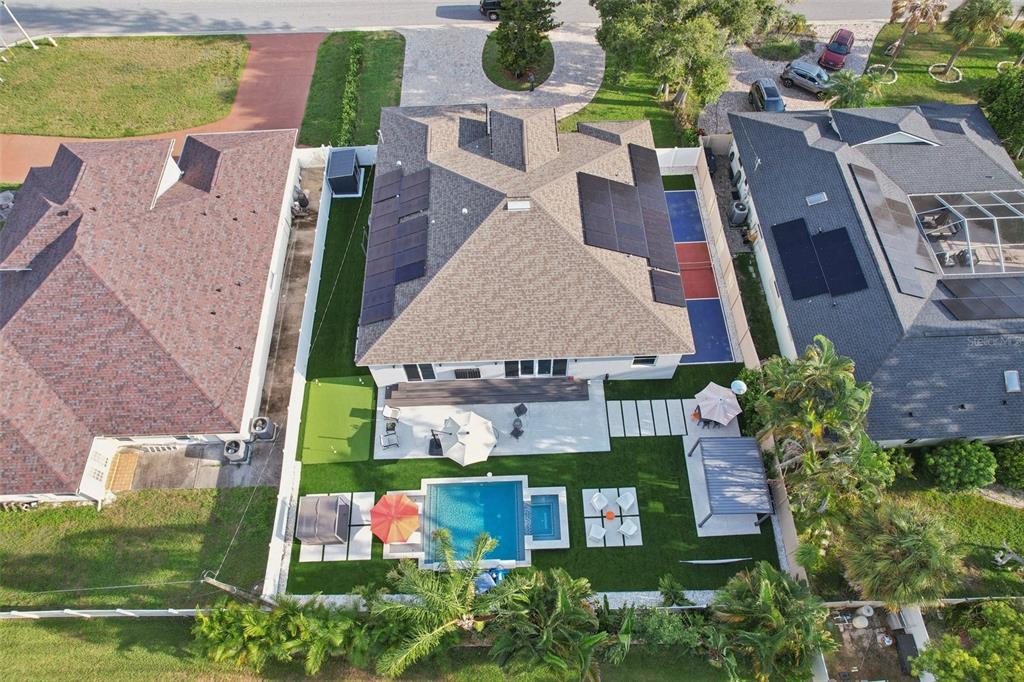 352 Mehlenbacher Road Belleair, FL 33756 - Photo 83 of 88 an aerial view of multiple houses with yard