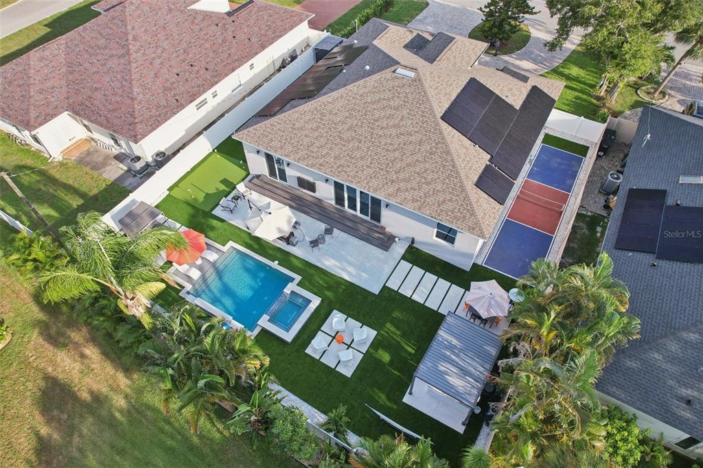 352 Mehlenbacher Road Belleair, FL 33756 - Photo 84 of 88 an aerial view of a house with a yard