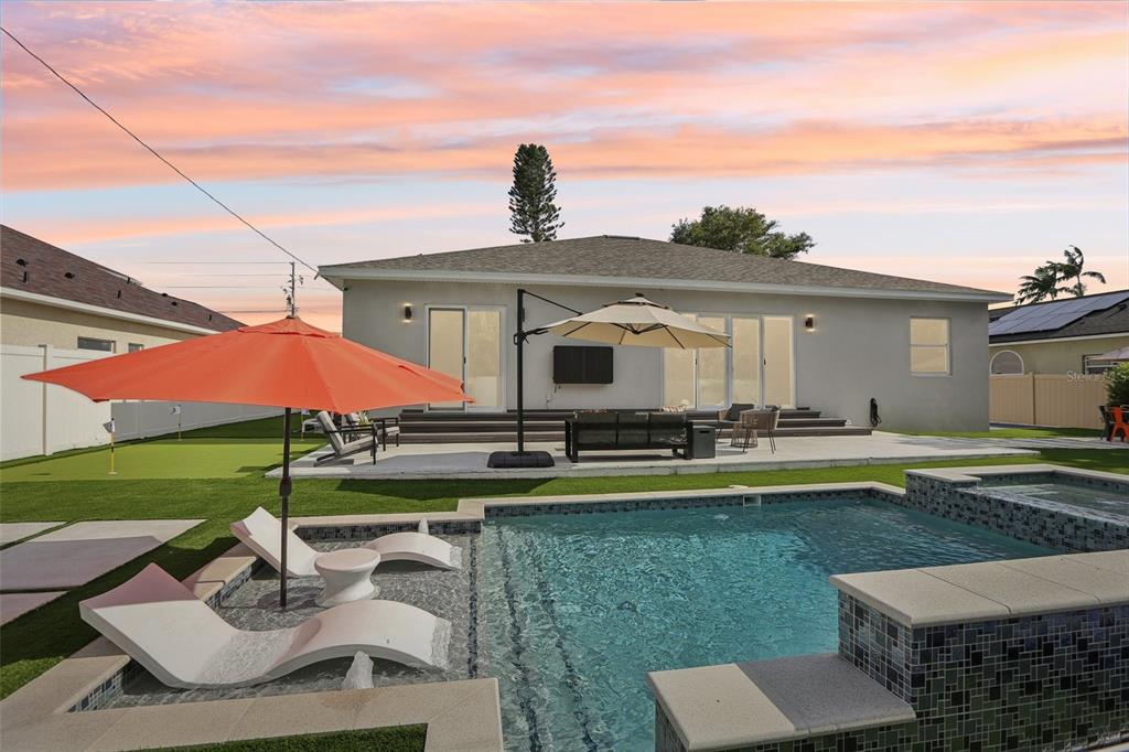 352 Mehlenbacher Road Belleair, FL 33756 - Photo 87 of 88 a front view of house with yard and outdoor seating