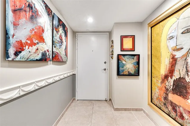 a view of a hallway with workspace