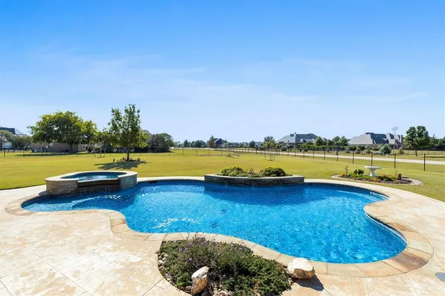 a view of a swimming pool and lake view