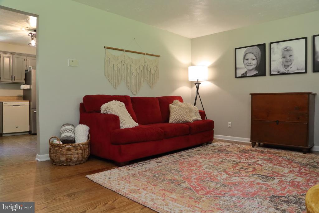 141 Frogtown Road Pequea, PA 17565 - Photo 5 of 28 a bedroom with a bed and a couch