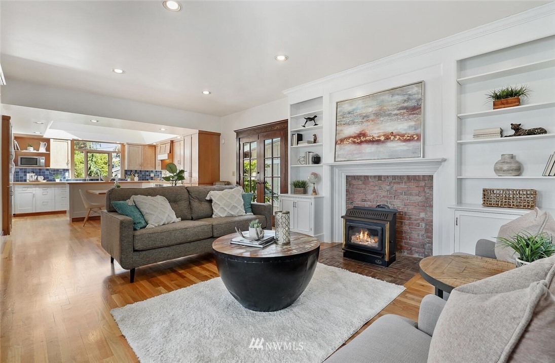 5124 1st Avenue Northwest Seattle, WA 98103 - Photo 13 of 35 a living room with furniture and a fireplace