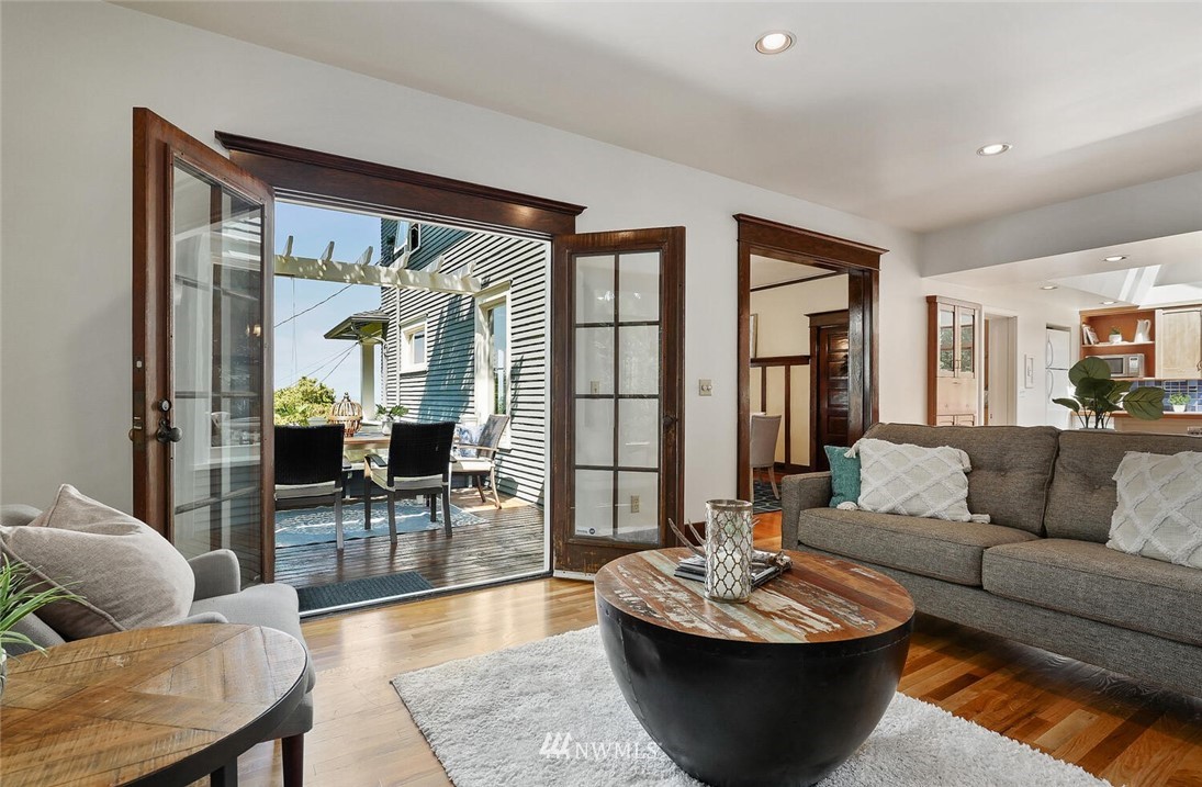5124 1st Avenue Northwest Seattle, WA 98103 - Photo 15 of 35 a living room with furniture and a large window