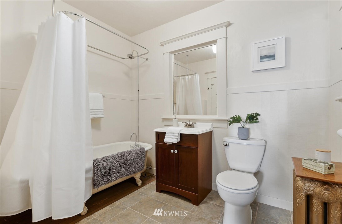 5124 1st Avenue Northwest Seattle, WA 98103 - Photo 22 of 35 a bathroom with a sink toilet and shower