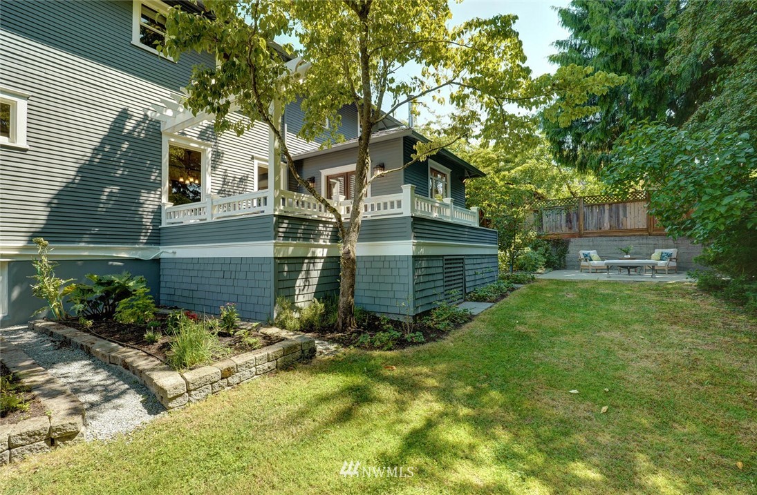 5124 1st Avenue Northwest Seattle, WA 98103 - Photo 28 of 35 a front view of a house with a yard