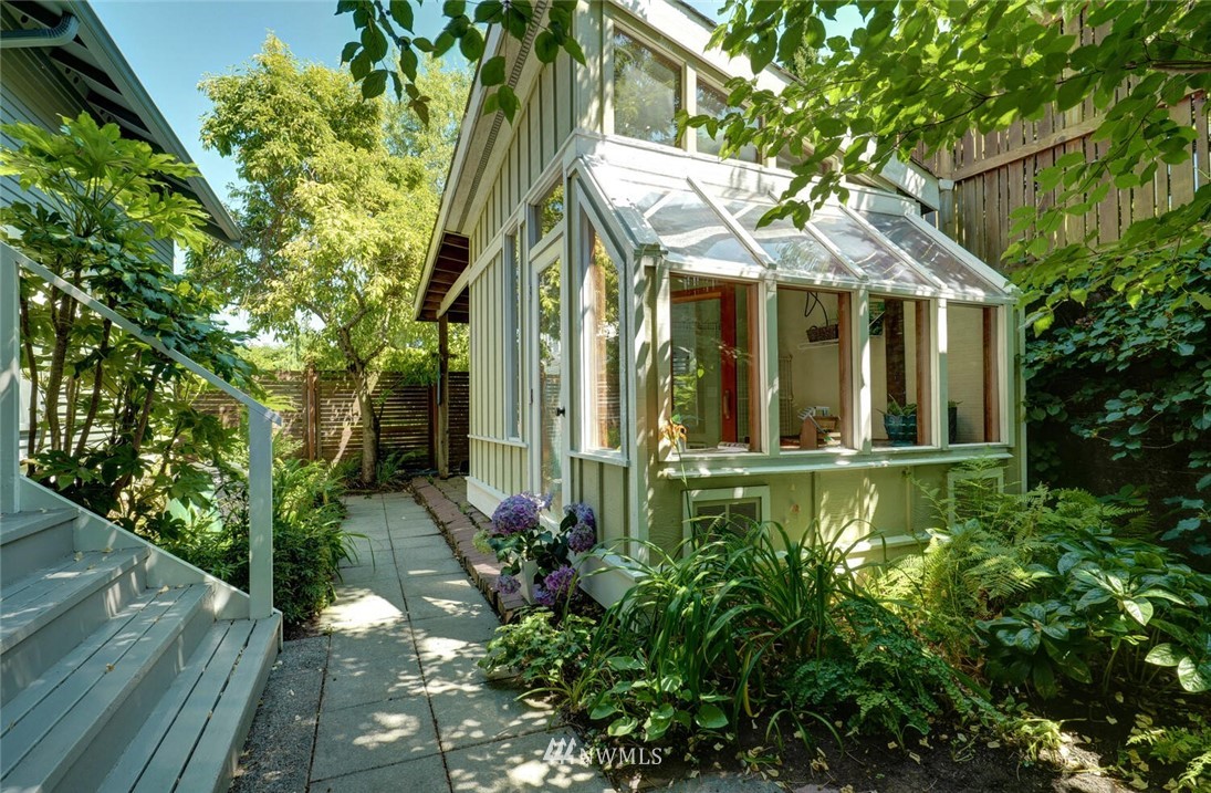 5124 1st Avenue Northwest Seattle, WA 98103 - Photo 30 of 35 a view of a house with a yard