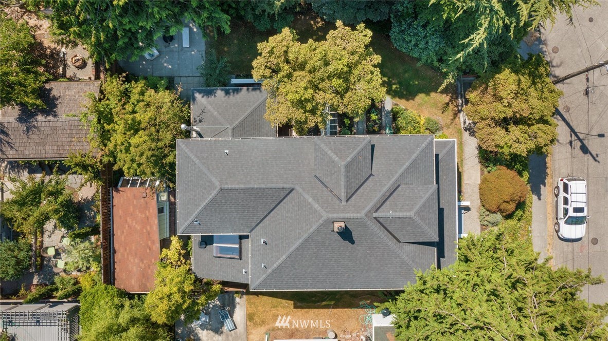 5124 1st Avenue Northwest Seattle, WA 98103 - Photo 33 of 35 an aerial view of a house with a yard and a large tree