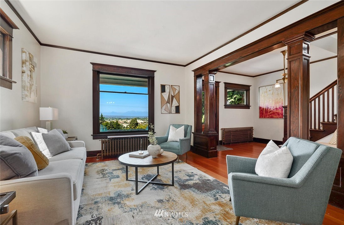 5124 1st Avenue Northwest Seattle, WA 98103 - Photo 5 of 35 a living room with furniture and a large window