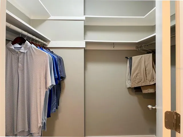 an aerial view of a house with a lake view