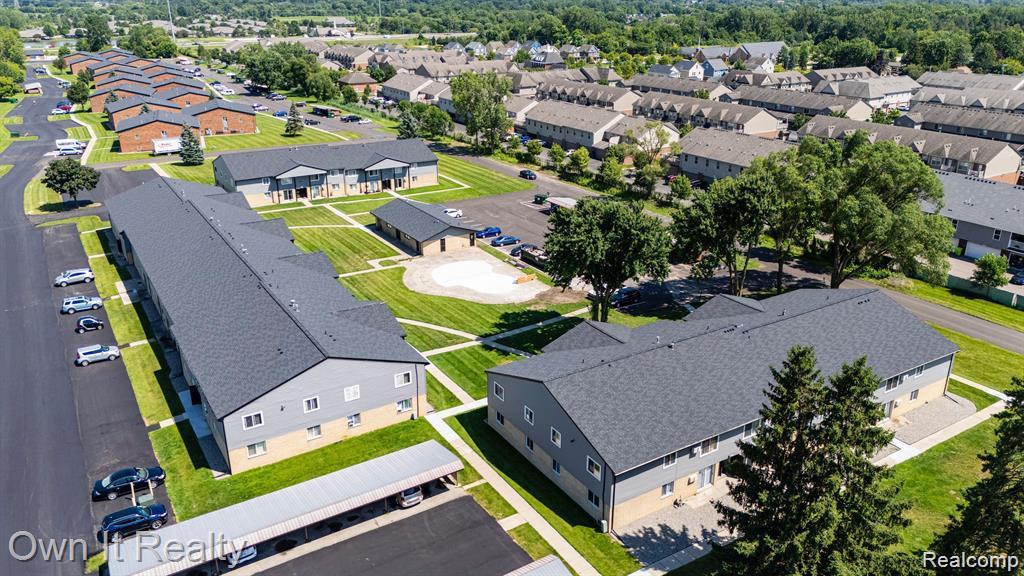 59314 Van Dyke Road Washington, MI 48094 - Photo 2 of 16 Aerial perspective of suburban area