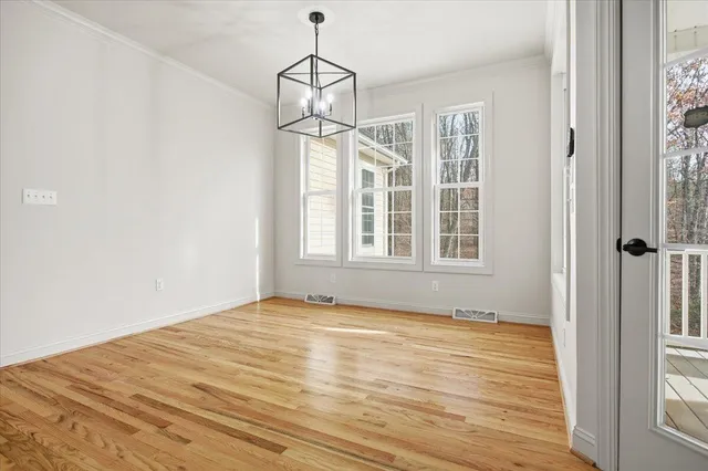 a bathroom with a shower and a sink