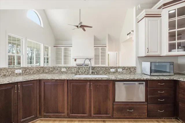 a bathroom with a tub and sink
