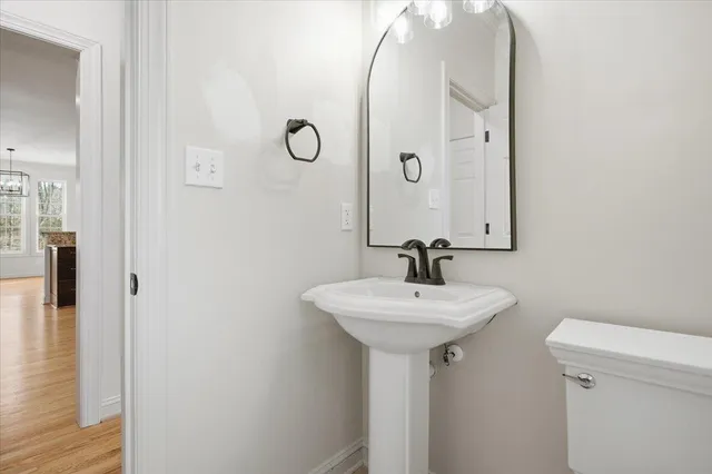 a view of empty room with wooden walls