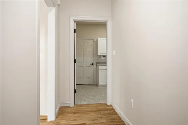 a view of a swimming pool with a table and chairs