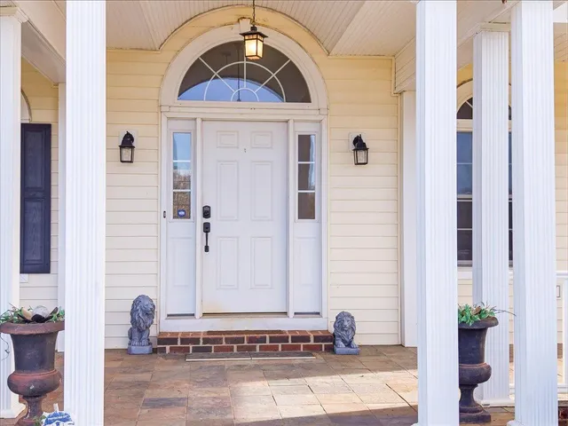 a view of a entryway door of the house