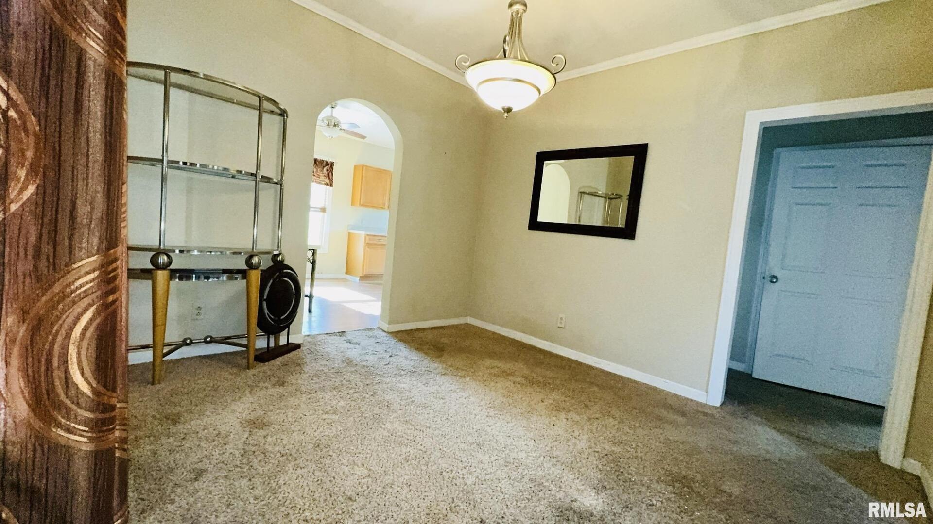 720 East Taylor Street Benton, IL 62812 - Photo 12 of 19 a view of a room with gym equipment