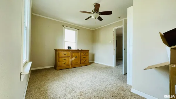 a view of a livingroom with a furniture
