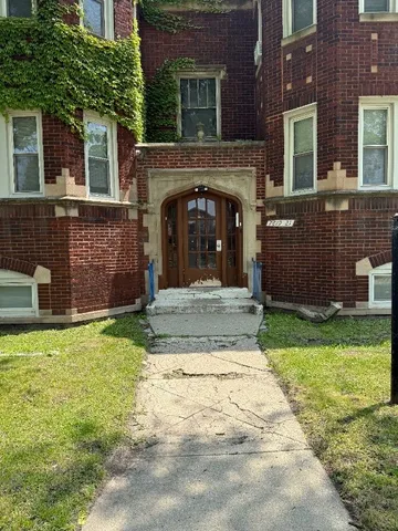 front view of a house with a yard