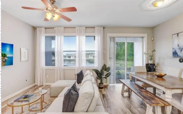 a view of a livingroom with furniture and window