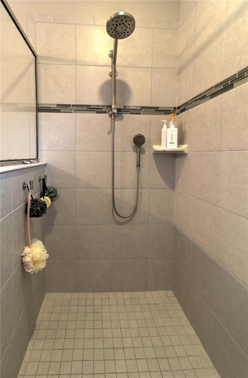 19744 Fort King Run Brooksville, FL 34601 - Photo 24 of 44 a bathroom with a shower