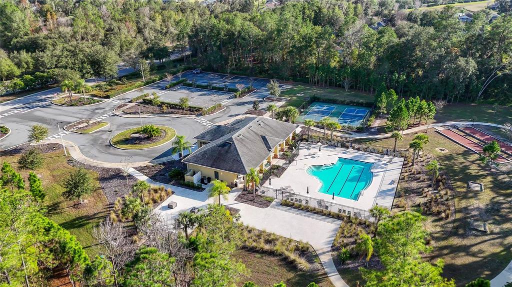 19744 Fort King Run Brooksville, FL 34601 - Photo 41 of 44 an aerial view of a house with a yard