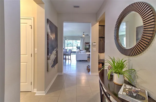 a lobby with furniture and wooden floor