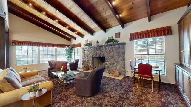 a view of a workspace with furniture