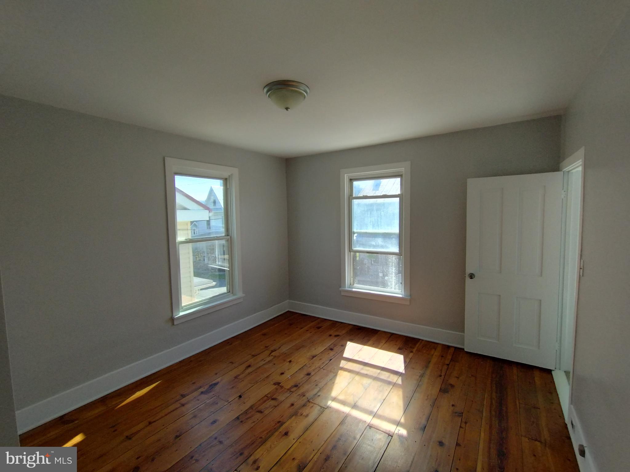 335 East Main Street Blain, PA 17006 - Photo 19 of 30 a view of empty room with wooden floor and fan