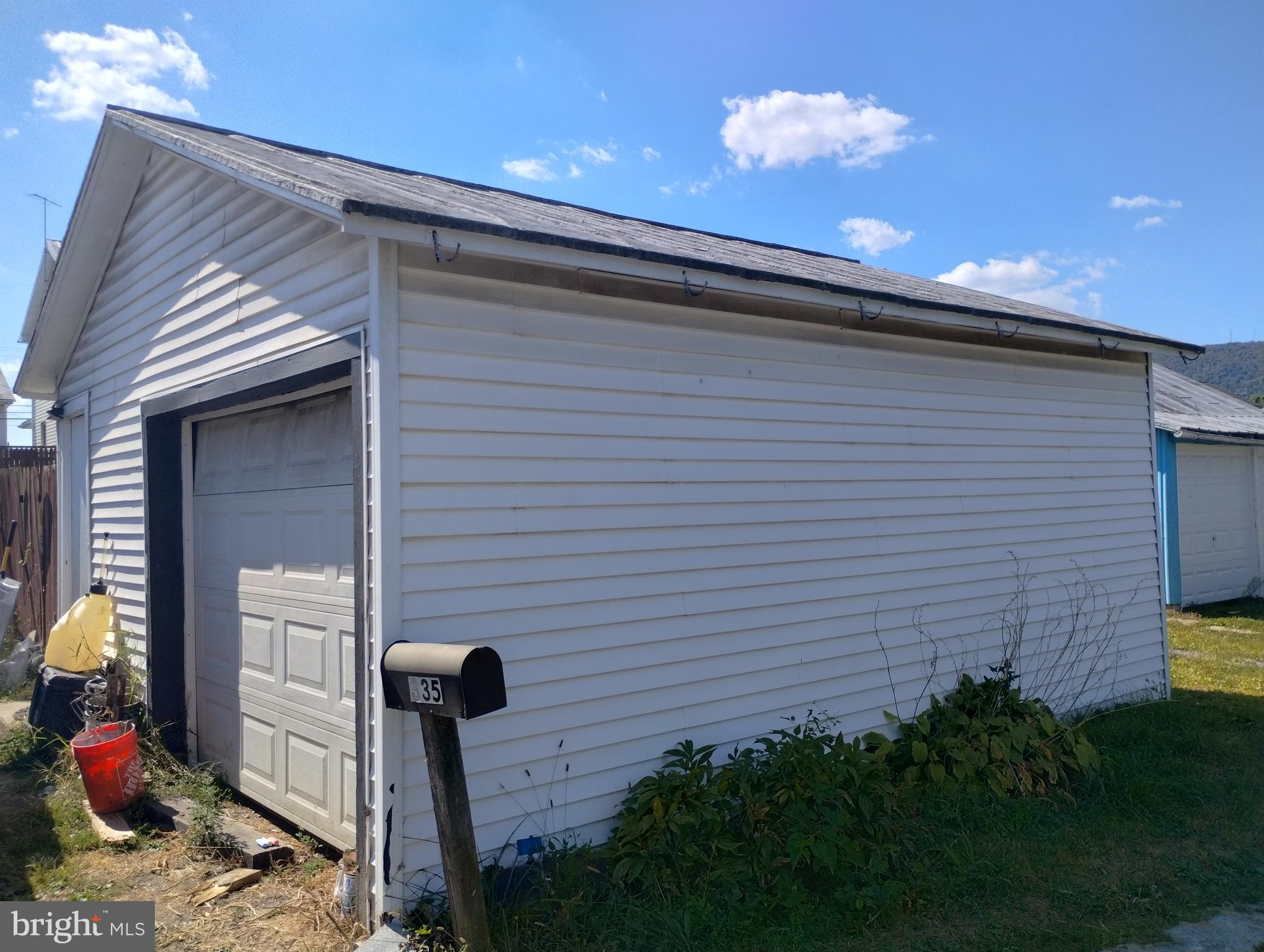 335 East Main Street Blain, PA 17006 - Photo 5 of 30 a view of a door of the house and a yard