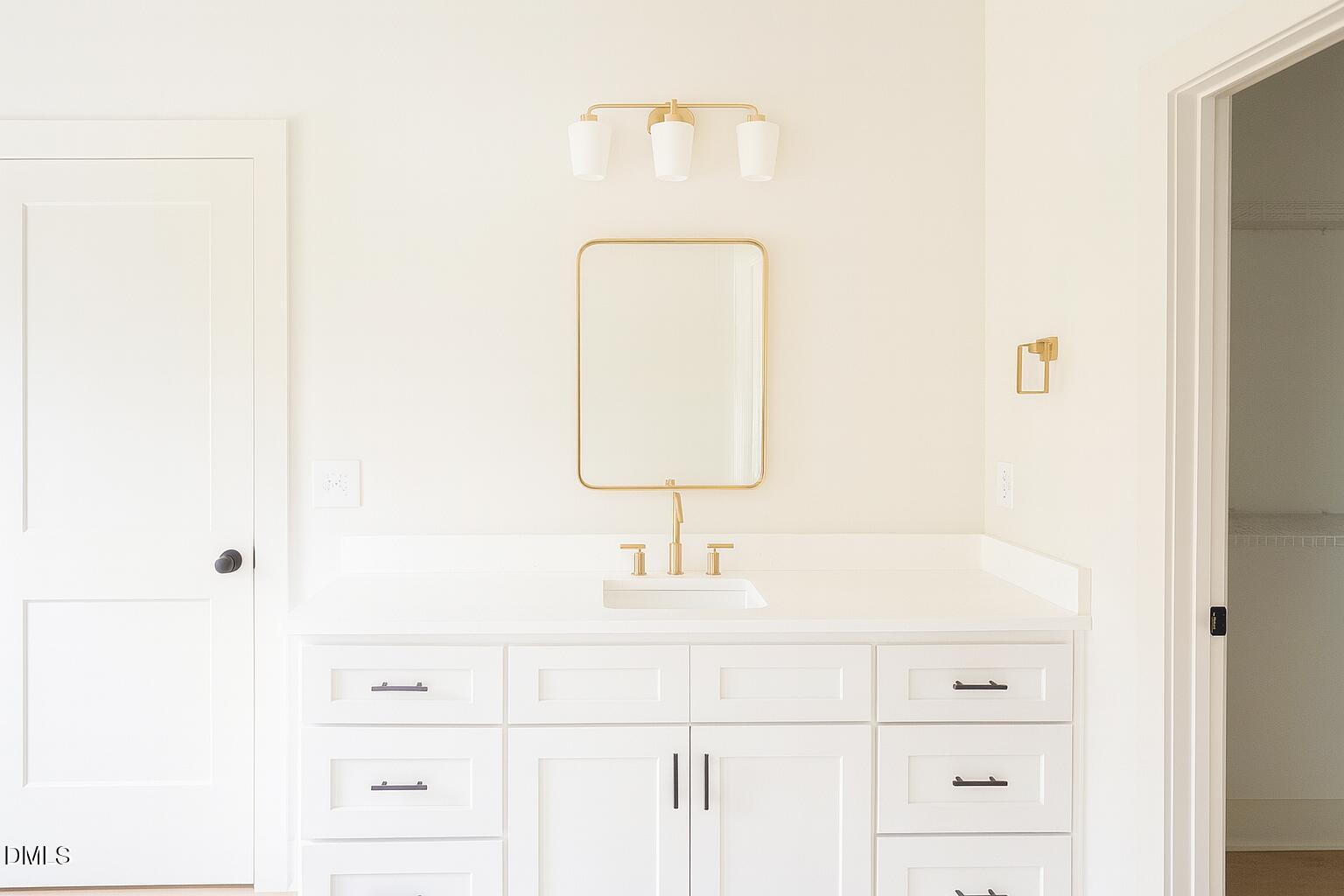 3345 Fleming Graham Road Burlington, NC 27217 - Photo 10 of 12 a bathroom with a sink and a mirror