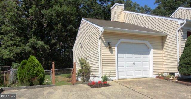 9562 Fort Foote Road Fort Washington, MD 20744 - Photo 3 of 30 Garage & Extended Driveway at Side Yard