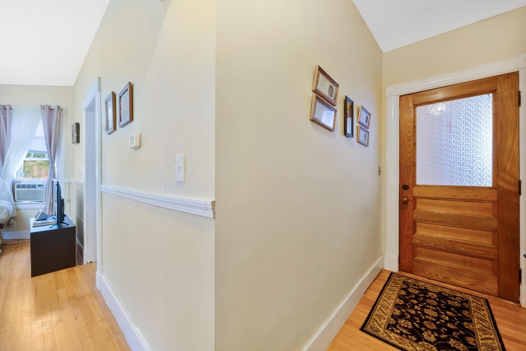 96 Garfield Street Springfield, MA 01108 - Photo 12 of 37 a view of an entryway with wooden floor