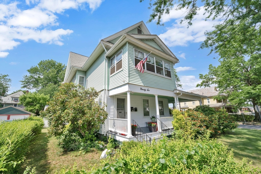 96 Garfield Street Springfield, MA 01108 - Photo 2 of 37 a front view of a house with garden