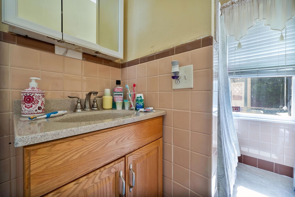 96 Garfield Street Springfield, MA 01108 - Photo 33 of 37 a bathroom with a sink and a shower