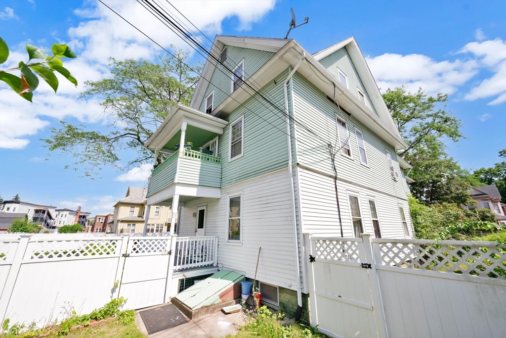 96 Garfield Street Springfield, MA 01108 - Photo 4 of 37 front view of a house with a street
