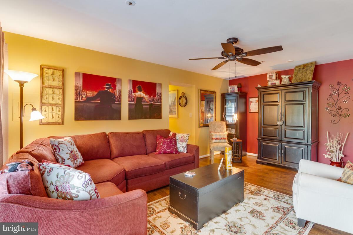 8559 Falls Run Road, Unit E Ellicott City, MD 21043 - Photo 11 of 34 Spacious Living Room, LVP flooring, ceiling fan