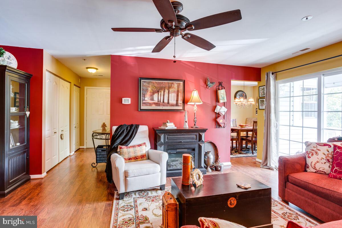 8559 Falls Run Road, Unit E Ellicott City, MD 21043 - Photo 13 of 34 Living Room , LVP flooring, slider to the balcony