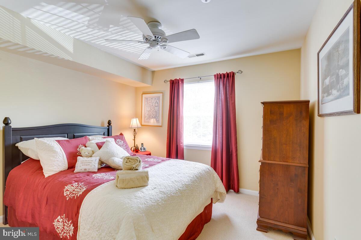 8559 Falls Run Road, Unit E Ellicott City, MD 21043 - Photo 22 of 34 Bedroom 2, ceiling fan