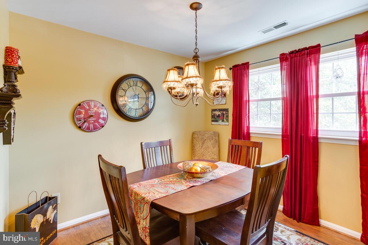 8559 Falls Run Road, Unit E Ellicott City, MD 21043 - Photo 8 of 34 Formal Dining Room, LVP flooring
