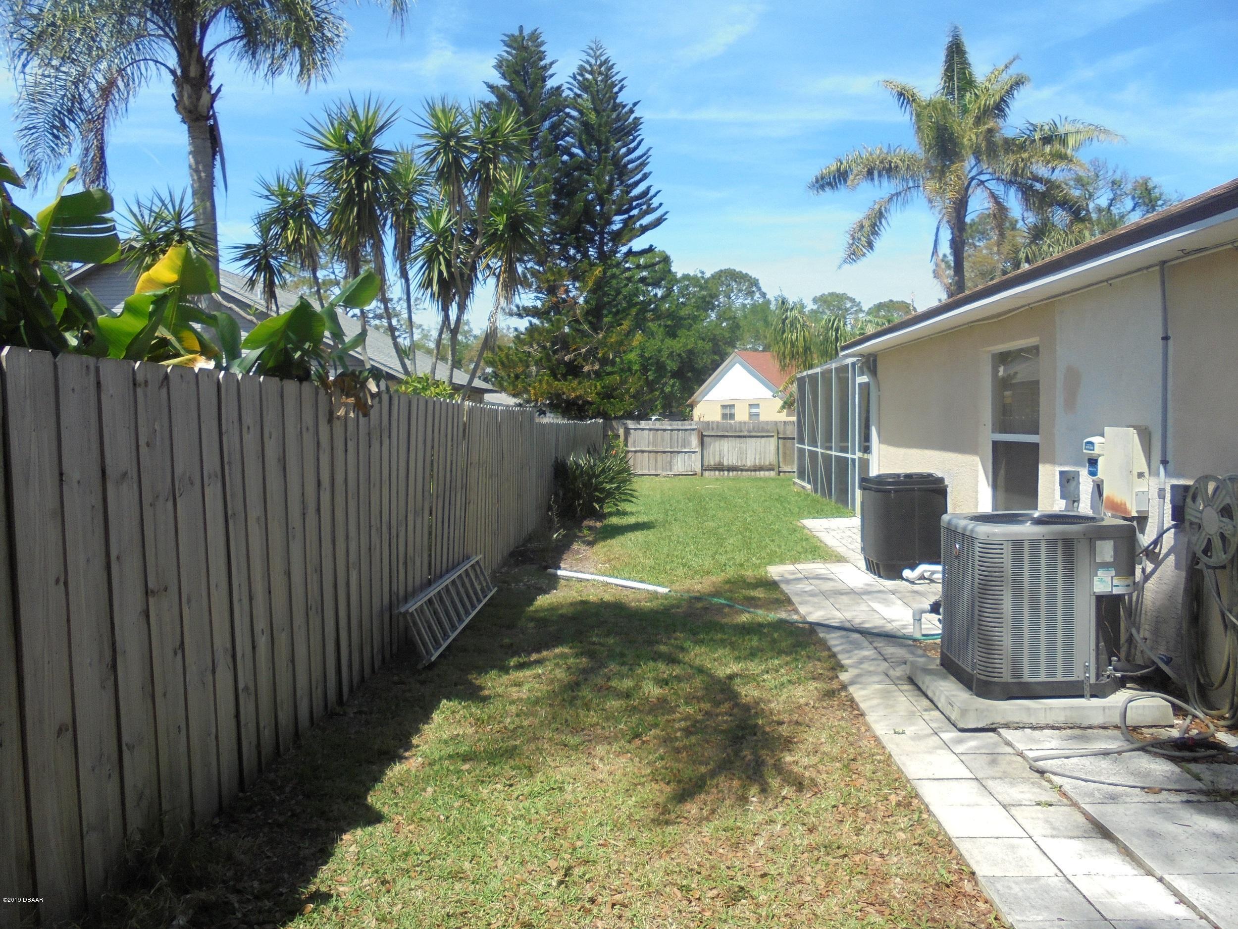 601 Newton Road Port Orange, FL 32127 - Photo 38 of 43 GATE SIDE