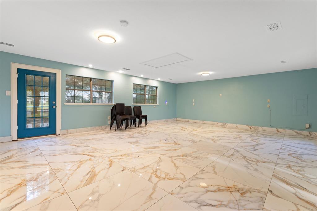 708 Sam Davis Road Argyle, TX 76226 - Photo 22 of 36 a large white bed in a white room