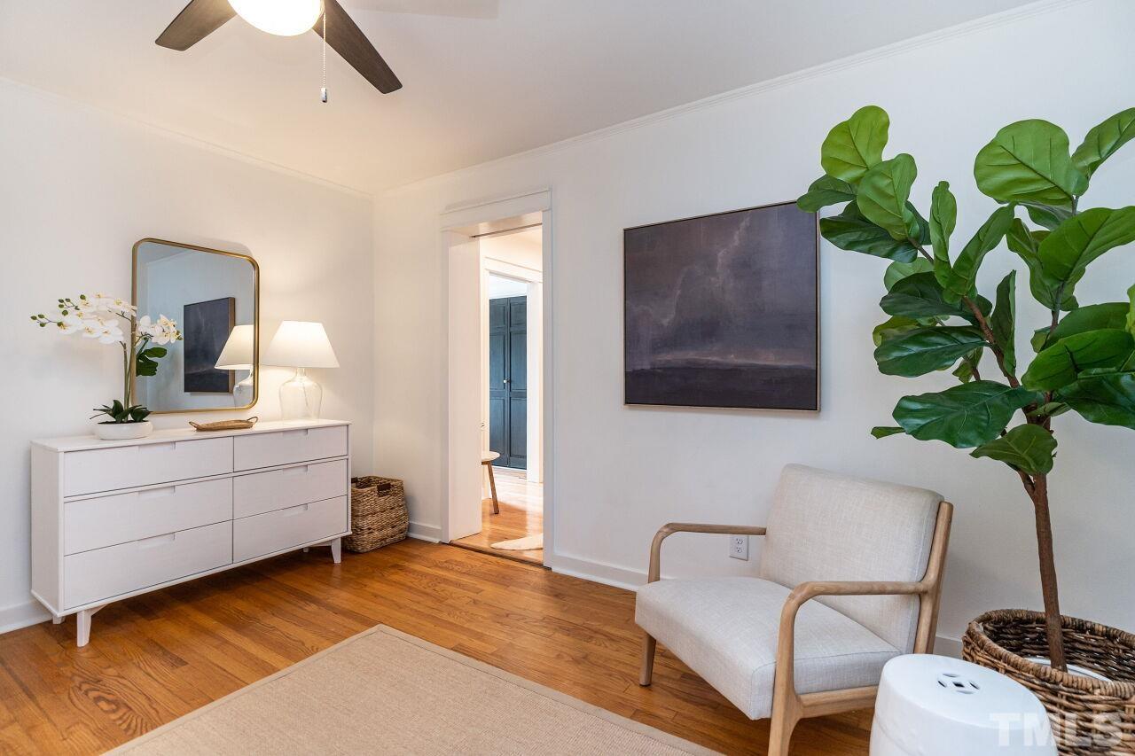 114 Hudson Street Raleigh, NC 27608 - Photo 12 of 23 a room with furniture and a potted plant