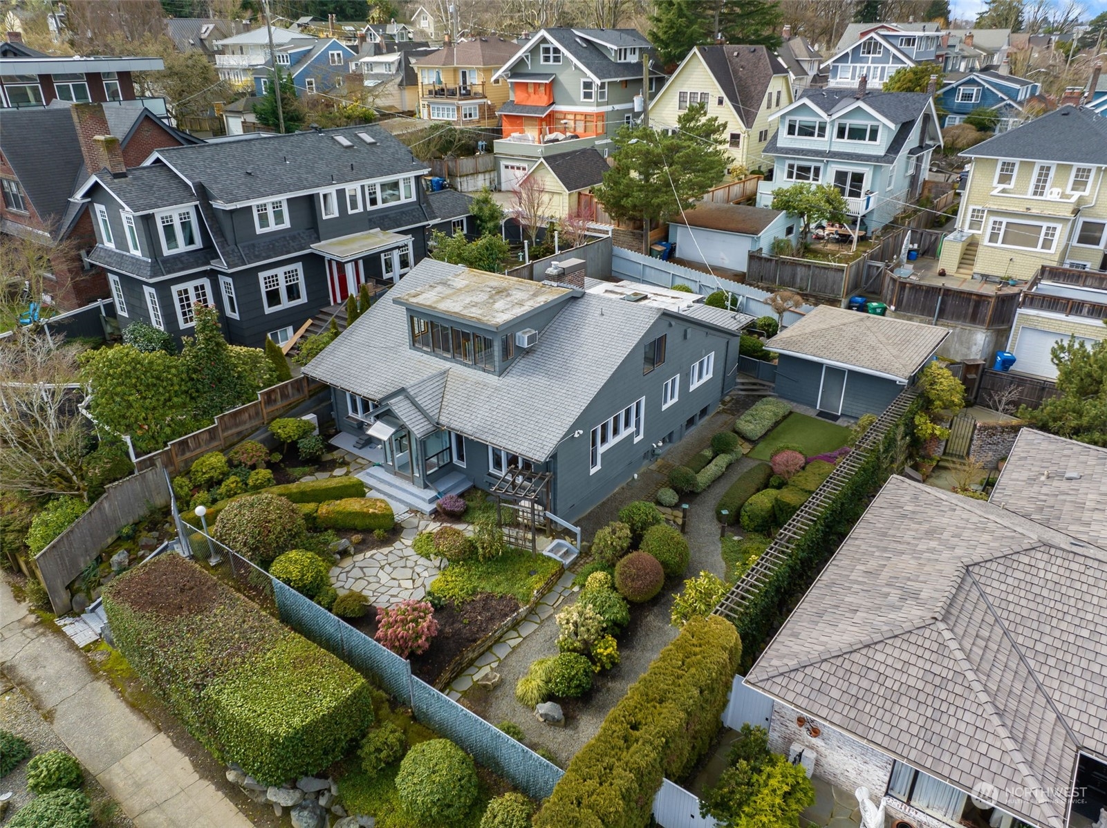 1941 15th Avenue East Seattle, WA 98112 - Photo 12 of 37 an aerial view of multiple houses with a yard