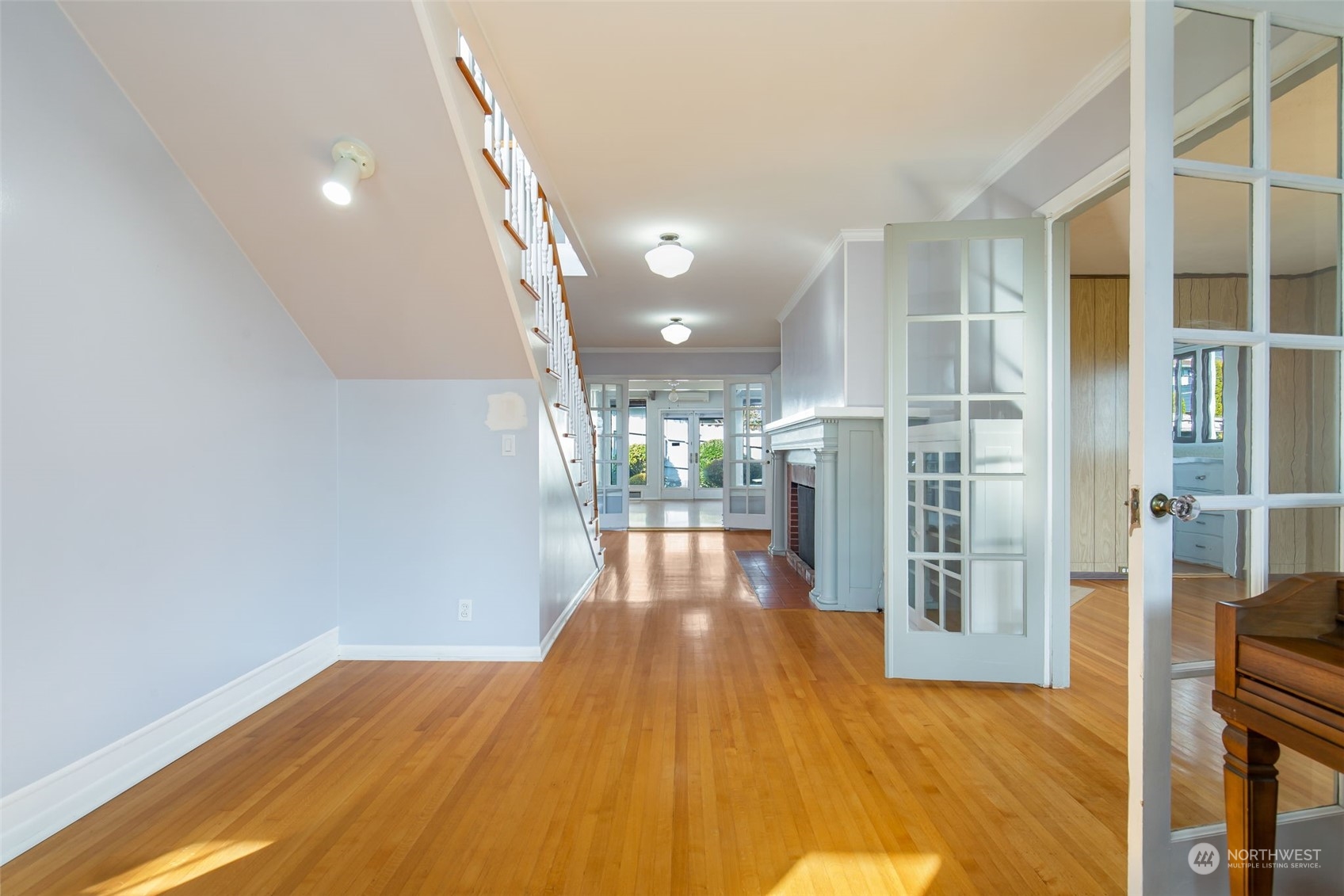 1941 15th Avenue East Seattle, WA 98112 - Photo 19 of 37 a view of entryway with wooden floor