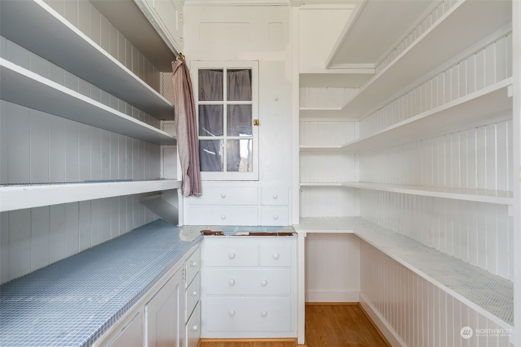 1941 15th Avenue East Seattle, WA 98112 - Photo 22 of 37 a view of walk in closet with empty racks