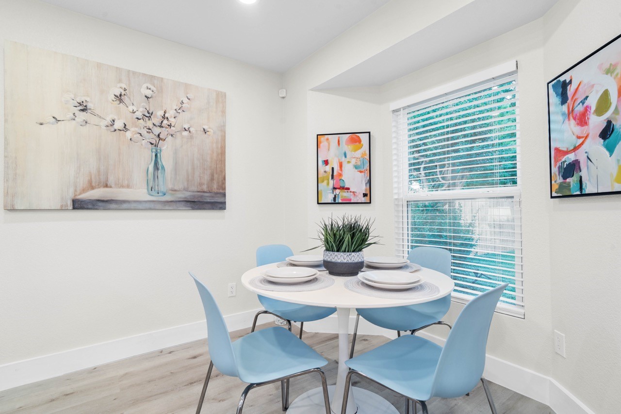3138 Sunbeam Street Houston, TX 77051 - Photo 27 of 50 Flooded with natural light, this cozy breakfast nook offers the perfect setting for slow mornings, intimate dinners, and everyday connection.